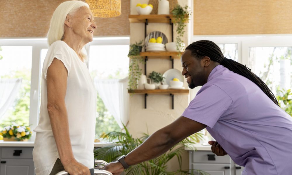 male-social-worker-taking-care-old-woman